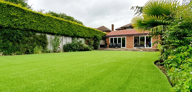 Types of artificial grass - lush green back garden