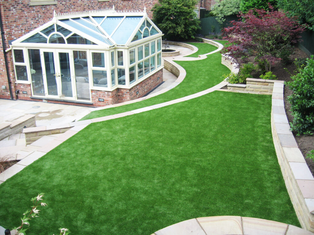 Large back garden with artificial grass