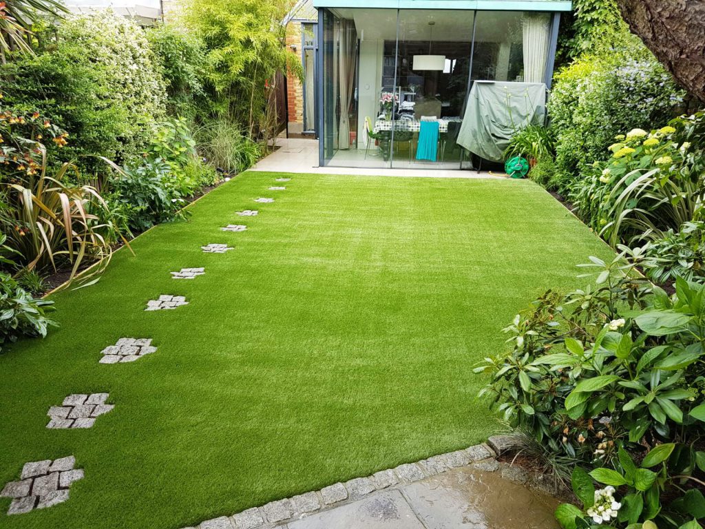 domestic artificial garden - back garden with artificial grass