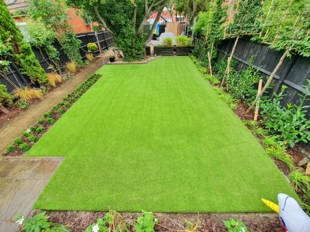 Domestic garden after shot with artificial grass Domestic garden after shot with artificial grass